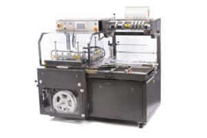Industrial shrink wrapping machine with control panel.