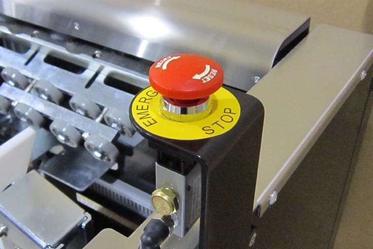 Emergency stop button of the EX-CF case former