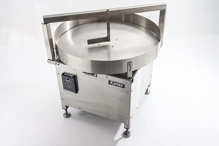 Overhead frame and divider paddle of the Eastey TT series rotary accumulation table