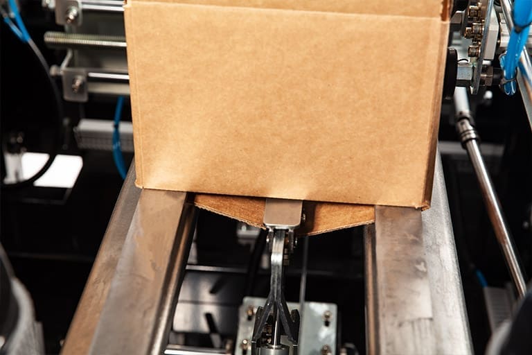 The bottom major flaps are folded to lock the case in the square or rectangle position on the ERX-15