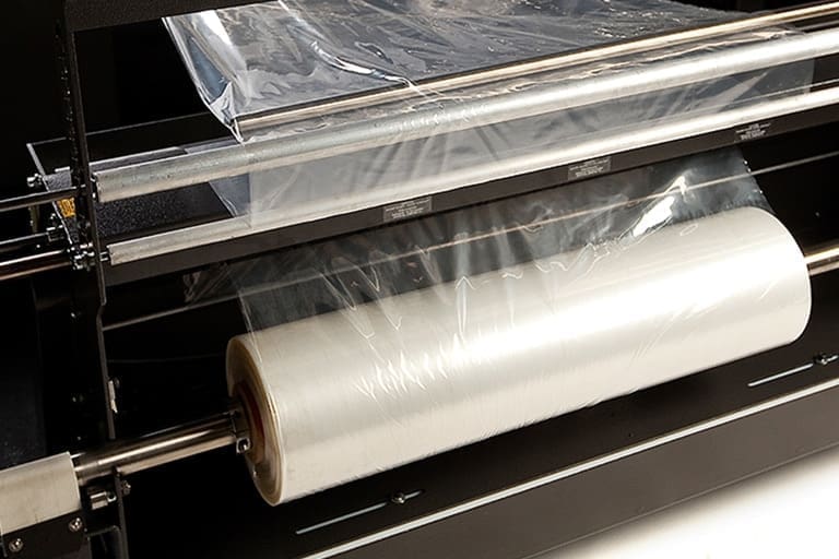 Power film unwind on the automatic l sealer