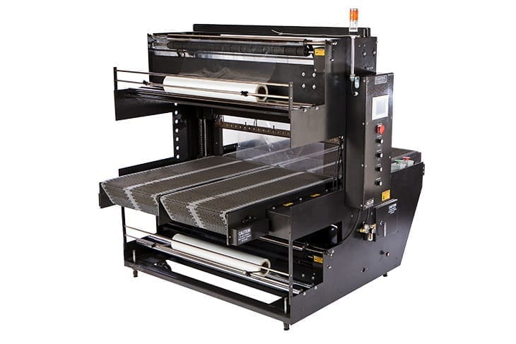 Industrial printing machine with multiple rollers.