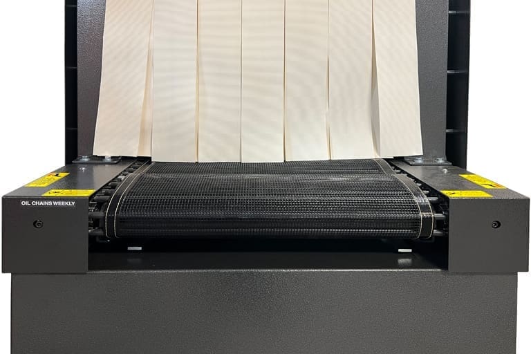 PTFE coated mesh belting overlay on a shrink tunnel