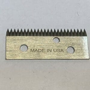 Metal blade with serrated edge, "Made in USA.