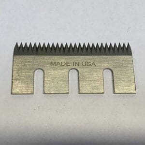 Metal comb blade with "Made in USA.