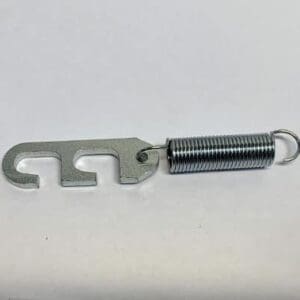 Metal hook with spring on white background.