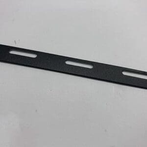 Black metal strip with cutouts.