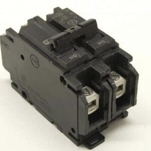 Black electrical circuit breaker on white background.