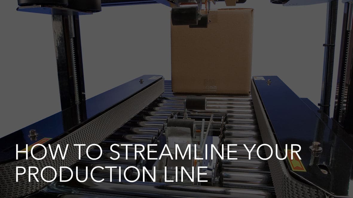 Box on conveyor belt in factory setting.