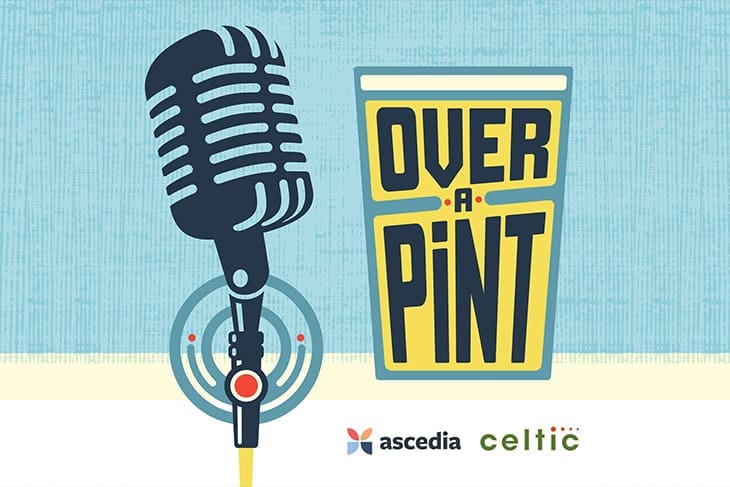Retro microphone and "Over a Pint" logo.