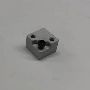 Here's an 8-word alt tag for the image: Gray metal part with a black connector.