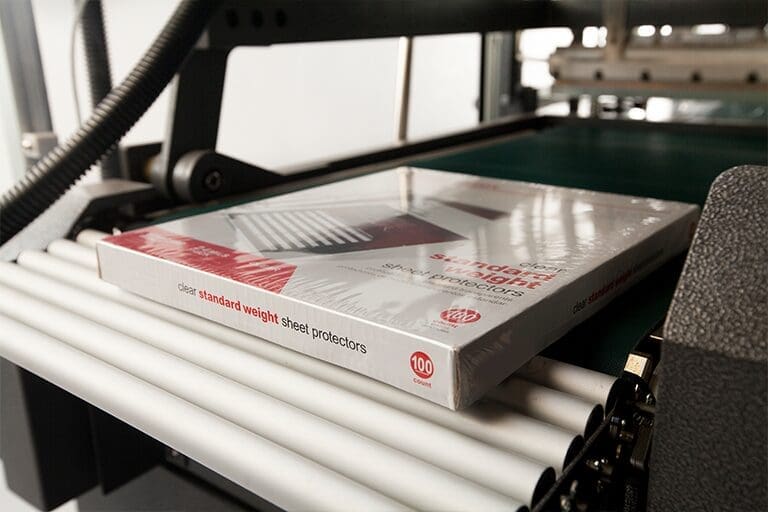 A shrink wrapped product on an Eastey conveyor