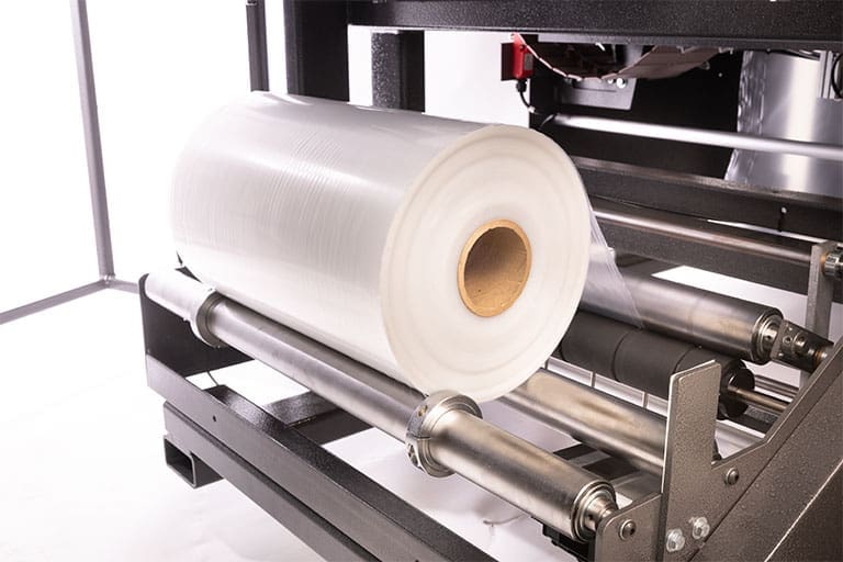 Roll of shrink wrap film on the ECB25A